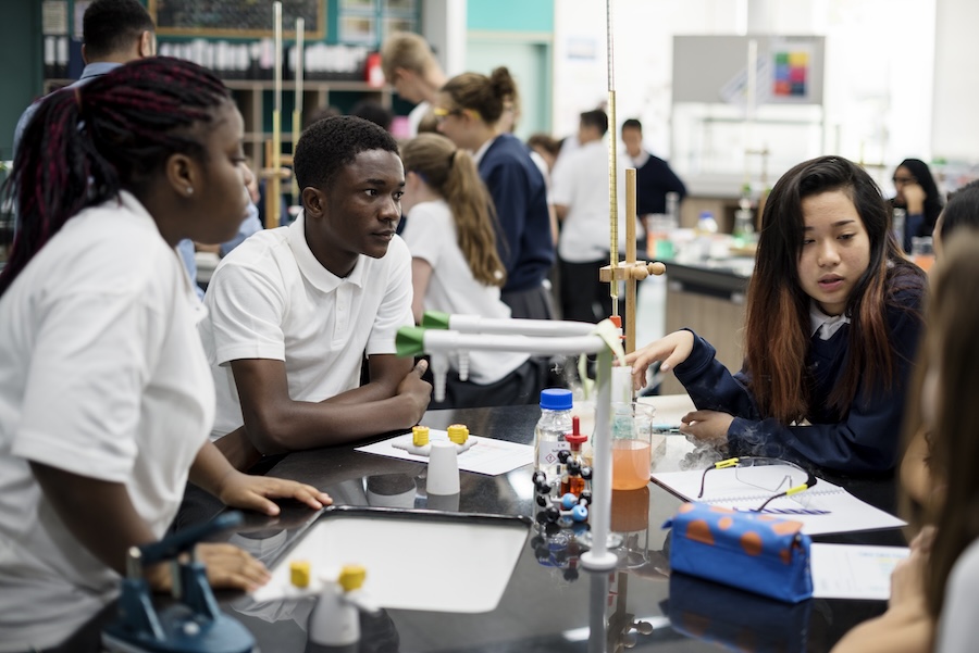 Group of students laboratory lab in science classroom Group of students laboratory lab in science classroom
